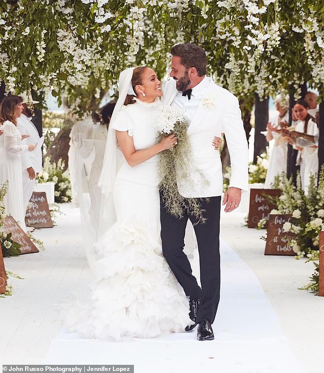 Lopez and Affleck rekindled in 2021 and married in a Las Vegas ceremony the following July, before throwing a lavish wedding at his Georgia estate in August 2022 (pictured)