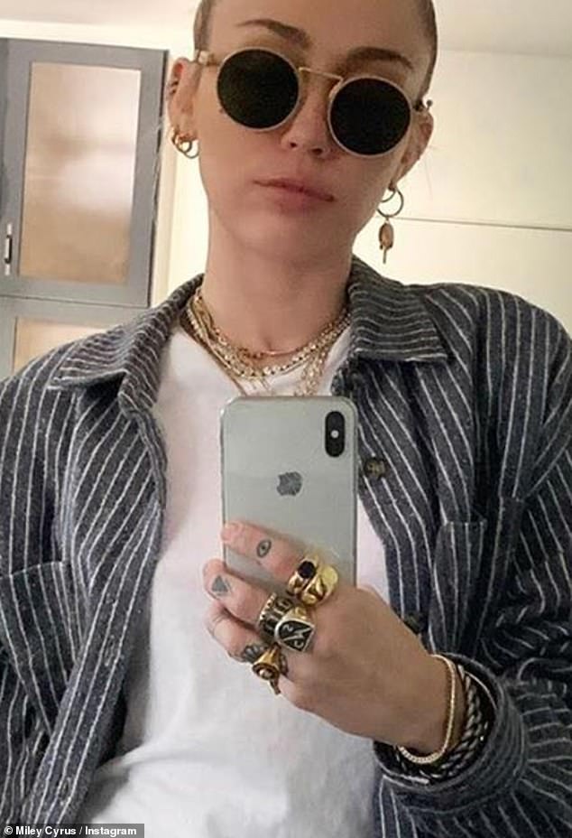 His ring: On Monday, Cyrus gave a hint as to the seriousness of her relationship with her new Australian boyfriend in another mirror selfie