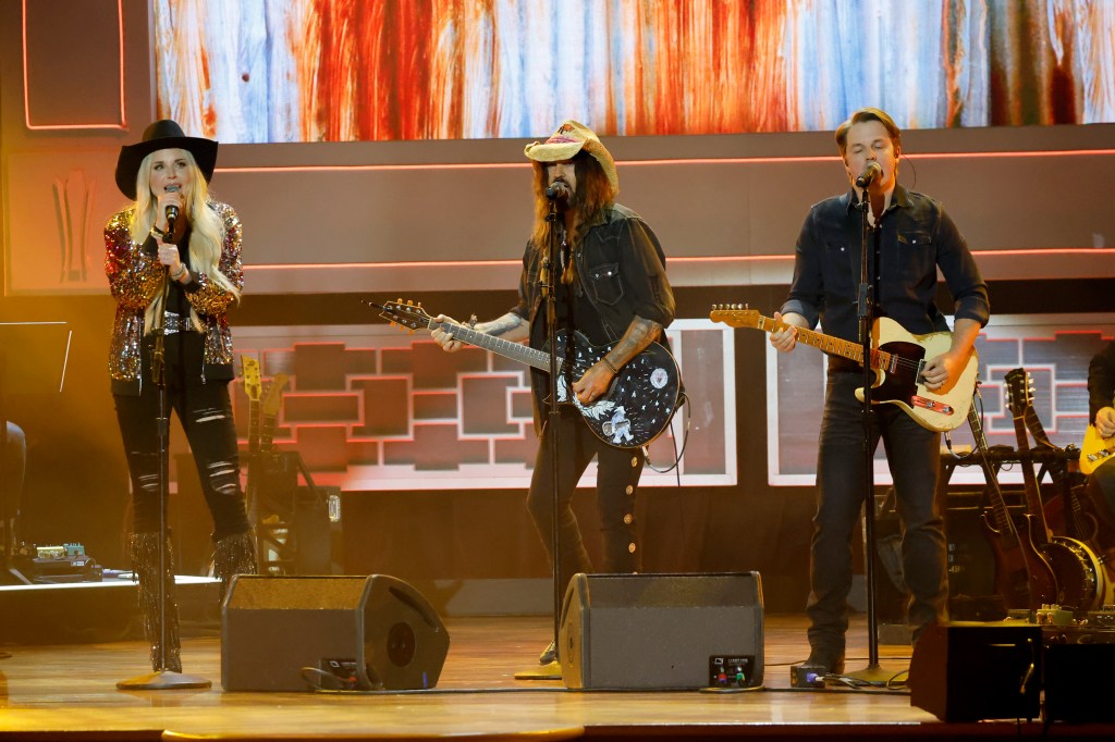 Firerose and Billy Ray on stage together alongside Travis Denning at the 16th Annual Academy of Country Music Honors at Ryman Auditorium on August 23, 2023.