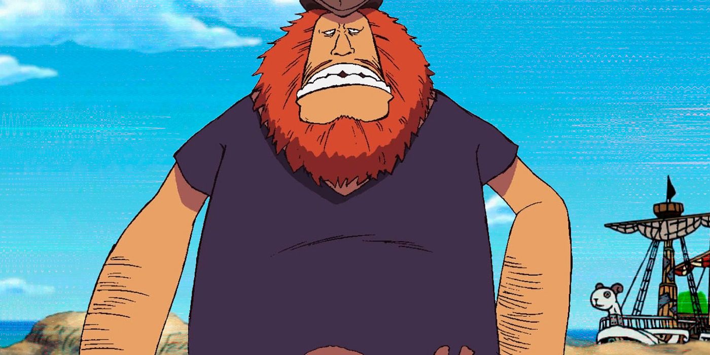 Jaguar D. Saul with his teeth showing against a blue sky with a ship on the right in One Piece's Water 7 saga