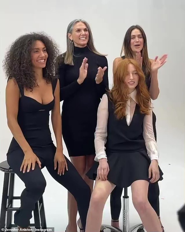 Credit where credit is due: The four beauties posed together in front of the camera before cheering for Jennifer, causing the actress to fan her eyes to stop herself from crying