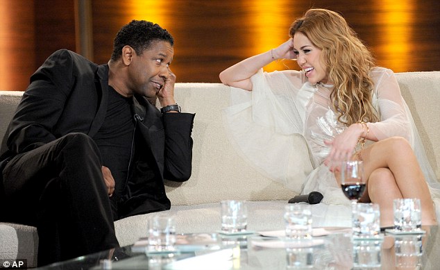 Catch up: The popstar chatted to actor Denzel Washington during the taping, who was there to promote new film Unstoppable