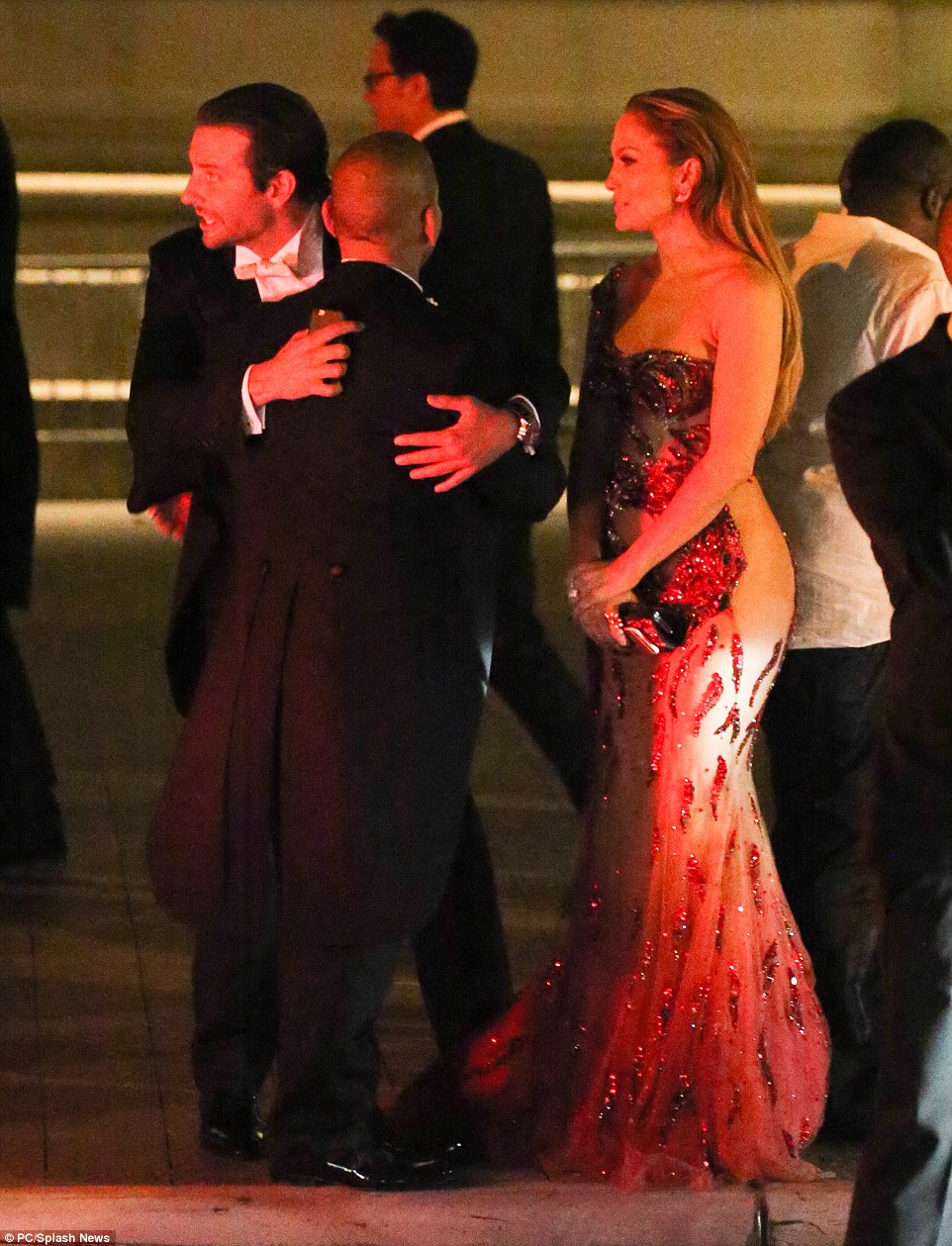 See you at the party: Bradley shared an embrace with the guest as they bid farewell