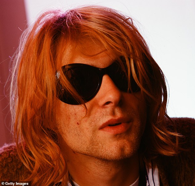 Lead vocalist and guitarist of grunge band Nirvana, Kurt Cobain (seen in 1992), famously dyed his hair pink