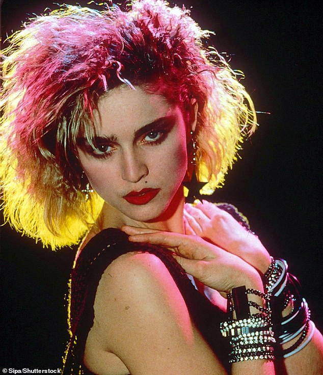 Madonna challenges the norm when it comes to hairstyles and she has dyed her hair various shades of pink (seen in 1984)