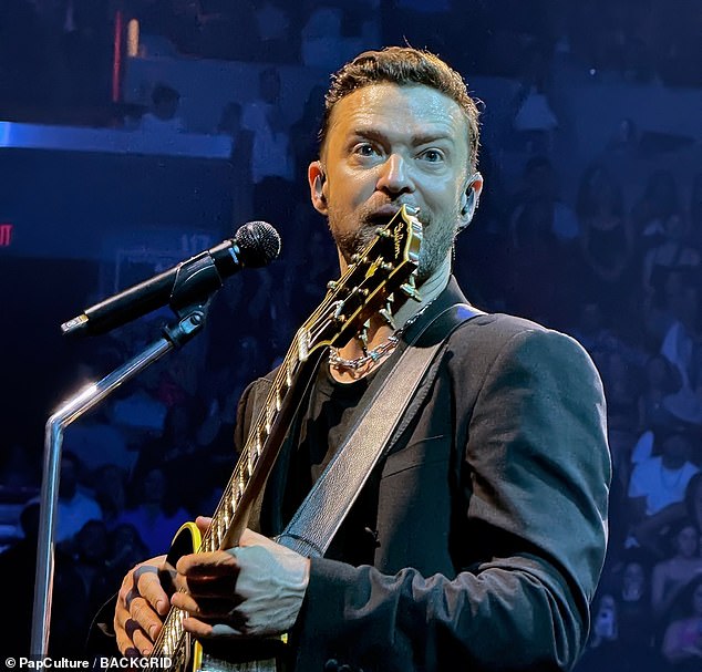 A report described Timberlake, seen here in Miami on Saturday, as having 'bloodshot and glassy' eyes, smelling strongly of alcohol, having slowed speech and was unable to maintain his attention