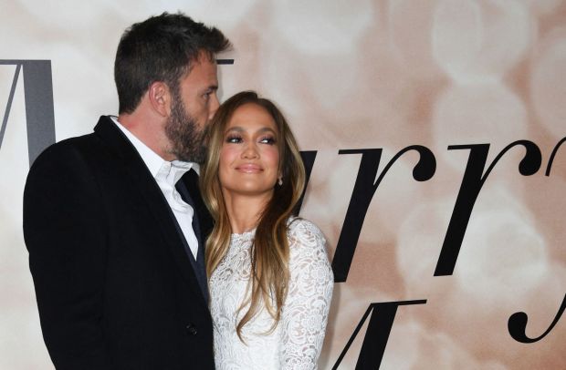 US actress Jennifer Lopez and actor Ben Affleck arrive for a special screening of "Marry Me" at the Directors Guild of America (DGA) in Los Angeles, February 8, 2022. (Photo by VALERIE MACON / AFP) (Photo by VALERIE MACON/AFP via Getty Images)