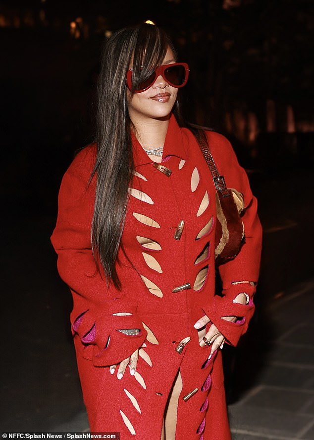 The multi-Grammy Award-winner, 36, slide out of the backseat of a chauffeured SUV dressed in a s3xy all-red look