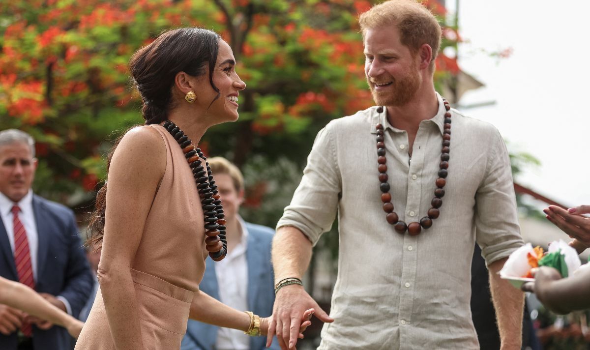 Meghan Markle and Prince Harry holding hands