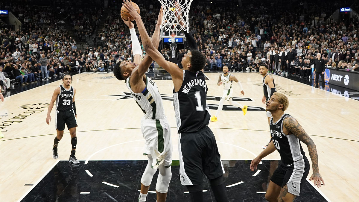 Milwaukee Bucks forward Giannis Antetokounmpo (34) shoots over San Antonio Spurs forward Victor Wembanyama (1)