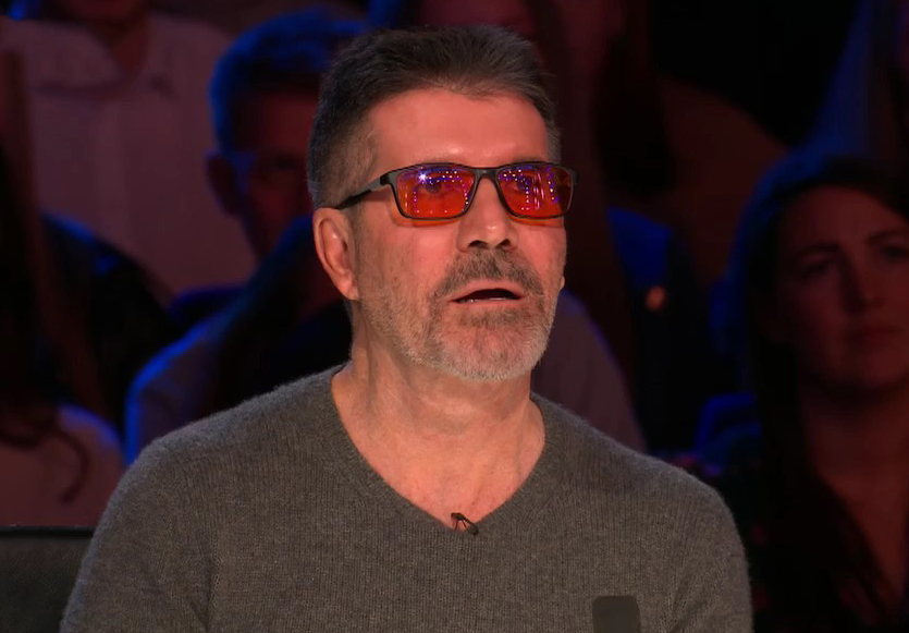 Previously fans called out Simon's red glasses