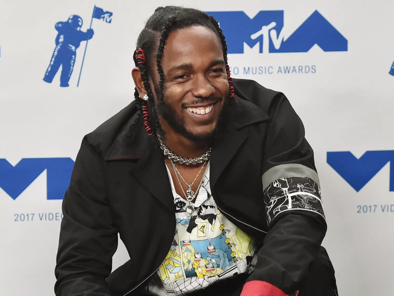 Kendrick Lamar, winner of Video of the Year, Best Hip Hop, Best Cinematography, Best Direction, Best Art Direction, Best Visual Effects for 'Humble', poses in the press room during the 2017 MTV Video Music Awards