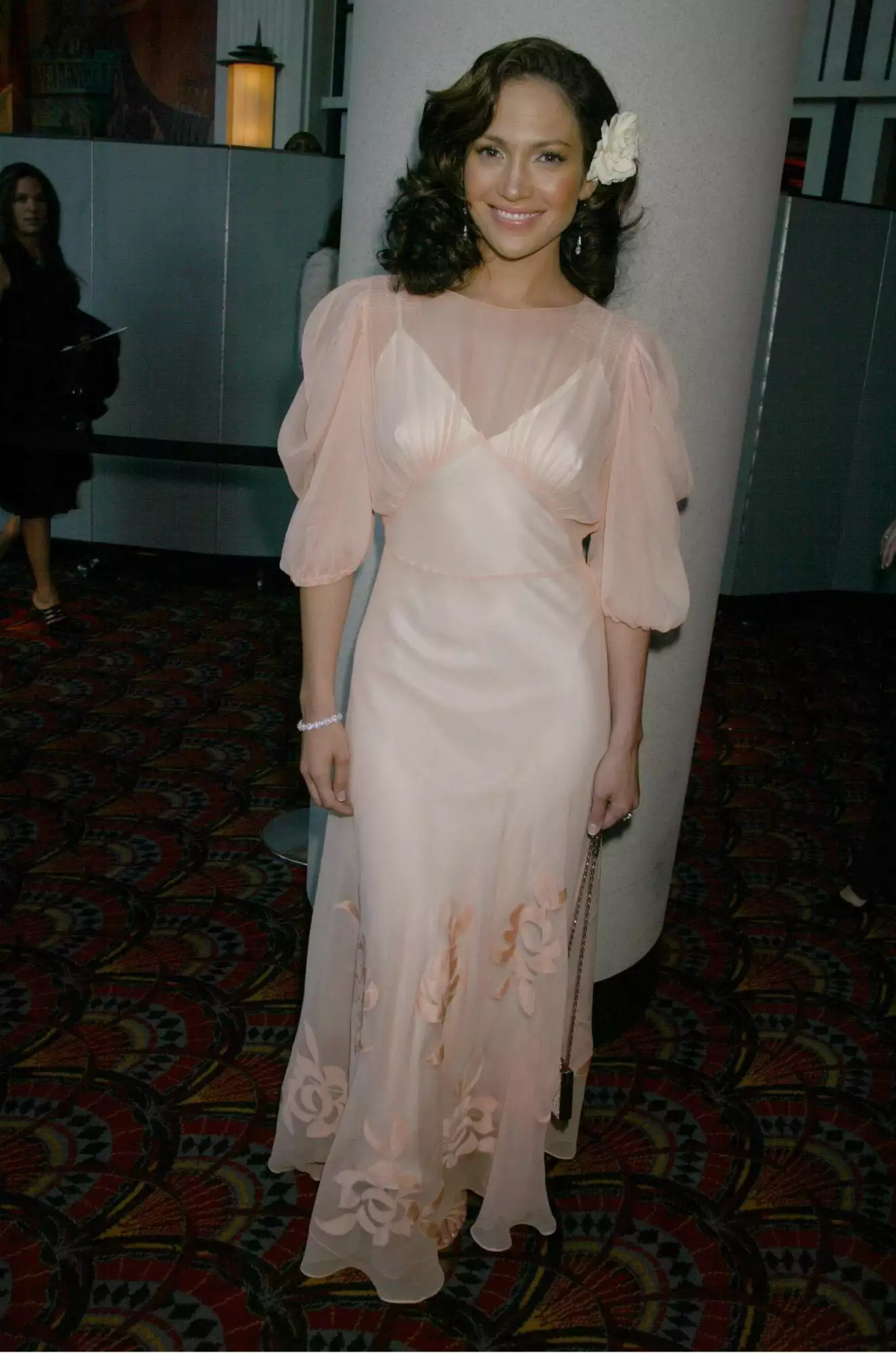 Jennifer Lopez in a sheer pink dress at the Premiere of Enough in 2002