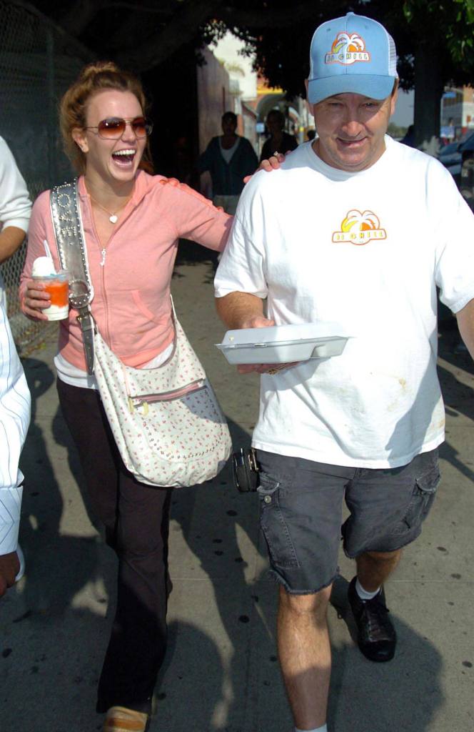 Britney Spears and Jamie Spears walking