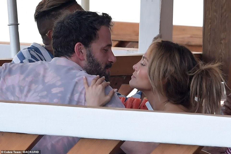 Sweet: They loving gazed into each others eyes while sitting next to each other at the table