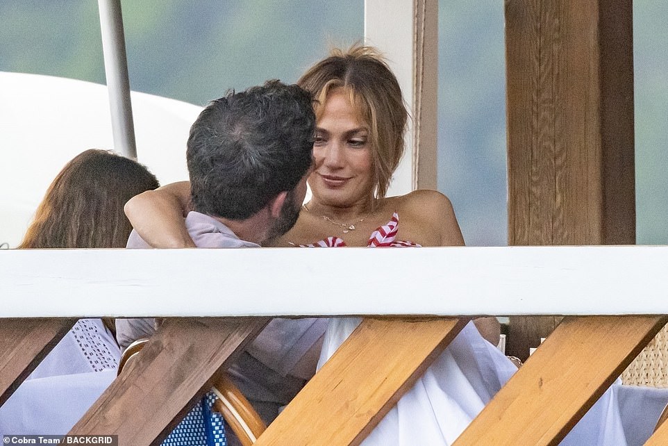 SO happy: Jennifer looked delighted as she eyed-up her hunky beau