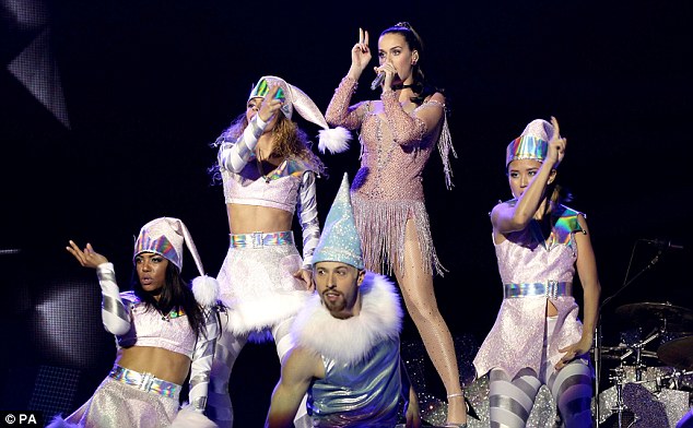 Future elves: Katy was joined on stage by some futuristic elves as dancers