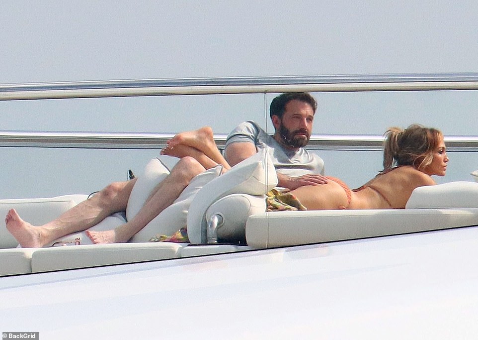 PICTURE EXCLUSIVE: Jennifer Lopez and beau Ben Affleck put on a raunchy display aboard $130m mega-yacht in Saint-Tropez... as they recreate THAT Jenny from the Block music video scene