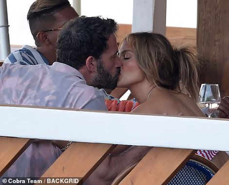 Steamy! Jennifer Lopez and Ben Affleck could not keep their hands off each other as they enjoyed dinner during their romantic stop in Nerano, Italy, on Wednesday