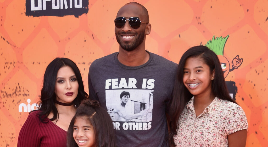 Vanessa Bryant posing with Kobe Bryant and their daughters