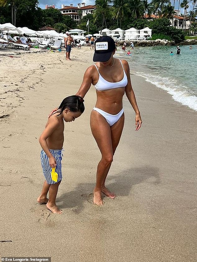 'My days are full of activities ¿ paddle tennis, the beach, lunch, drinks, socializing,' Eva told the outlet of her time on the Costa del Sol (pictured with Santiago on a Spanish beach)