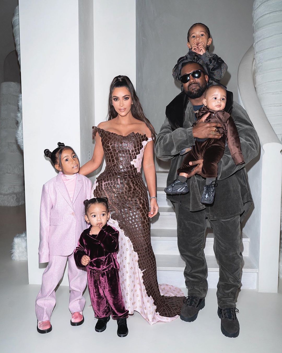 Kim Kardashian posed with Kanye and their fourth children in a group photo back in 2019