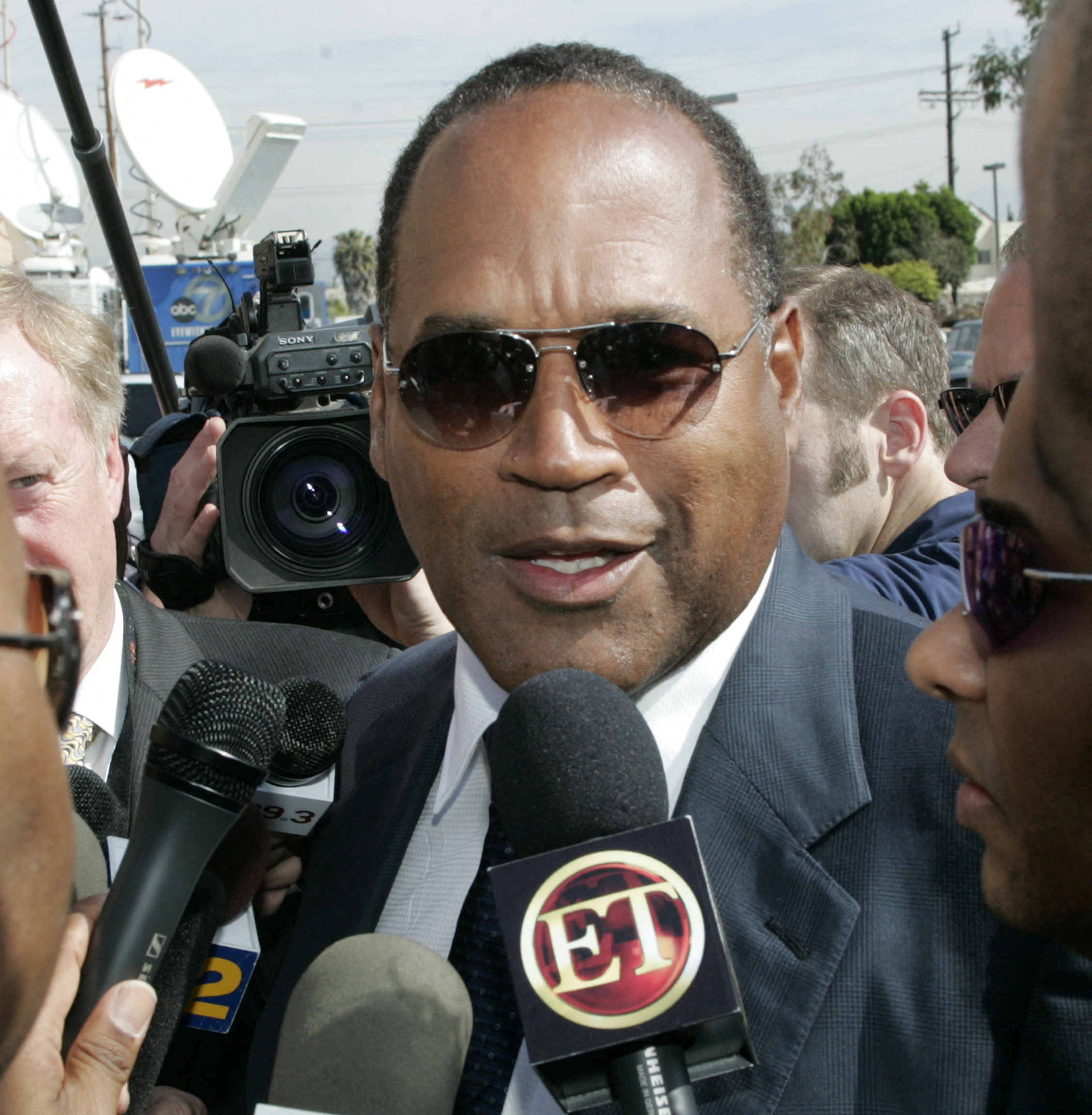 OJ Simpson talking to reporters.