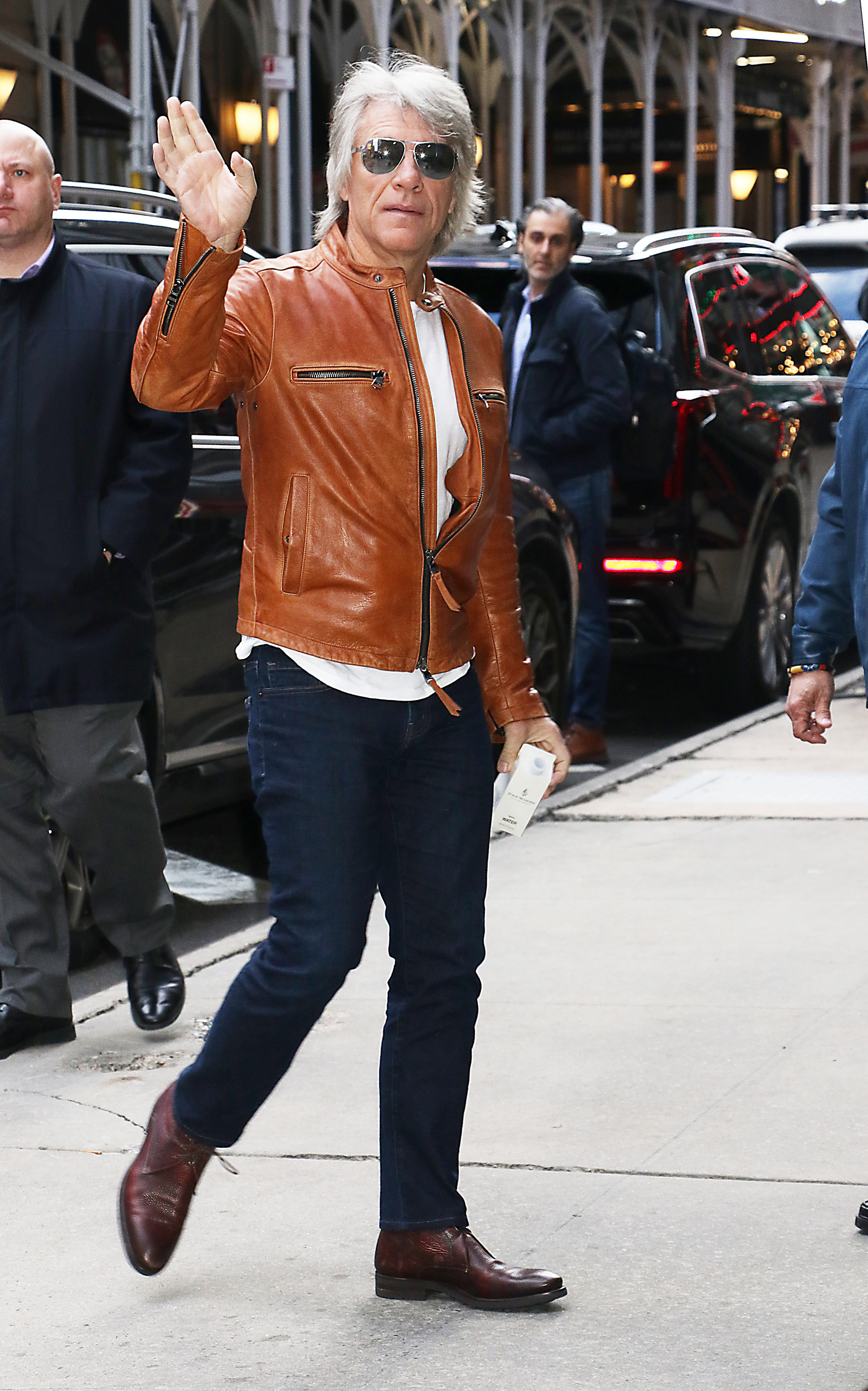 Jon Bon Jovi waving.