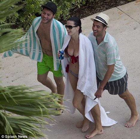 Entourage: Katy was joined by friends including her brother Daniel Hudson and stylist Logan Horne