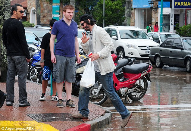 Low key: The actor was in typically casual mode and wore sunglasses despite the gloomy weather