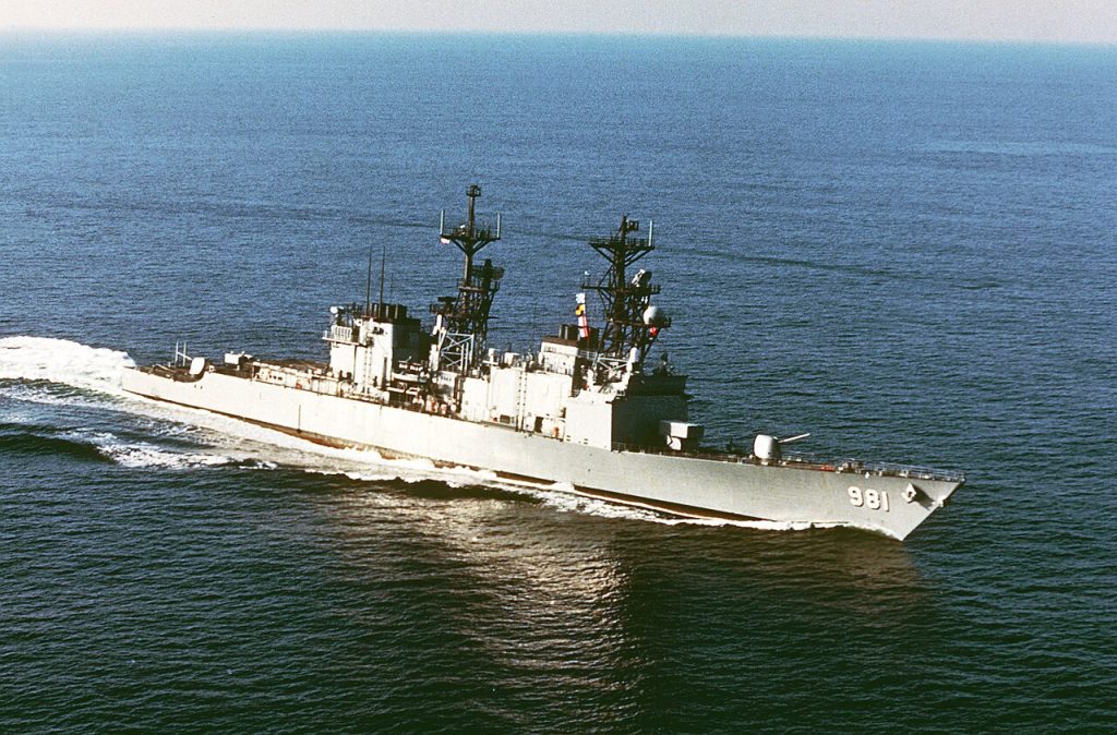 An aerial view of USS John Hancock on the move in 1983. 