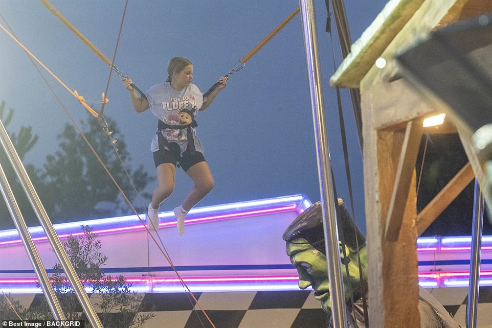 How high? While she also had a go on a bungee trampoline, as dad David proudly watched on