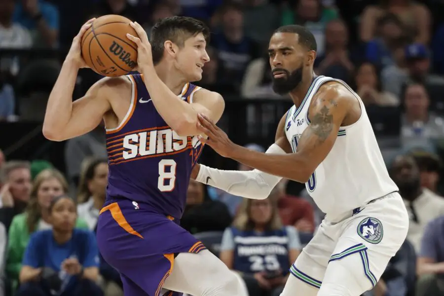 Apr 14, 2024; Minneapolis, Minnesota, USA; Phoenix Suns guard Grayson Allen (8) works around Minnesota Timberwolves guard Mike Conley (10) in the fourth quarter at Target Center. Mandatory Credit: Bruce Kluckhohn-USA TODAY Sports (Milwaukee Bucks)