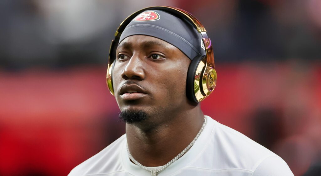 Deebo Samuel of San Francisco 49ers looking on.