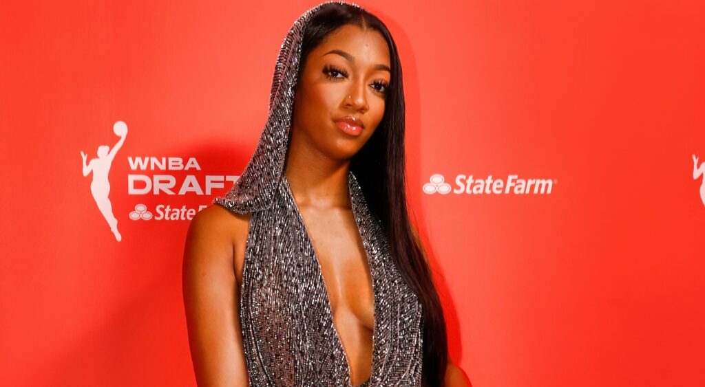 Angel Reese posing at WNBA Draft