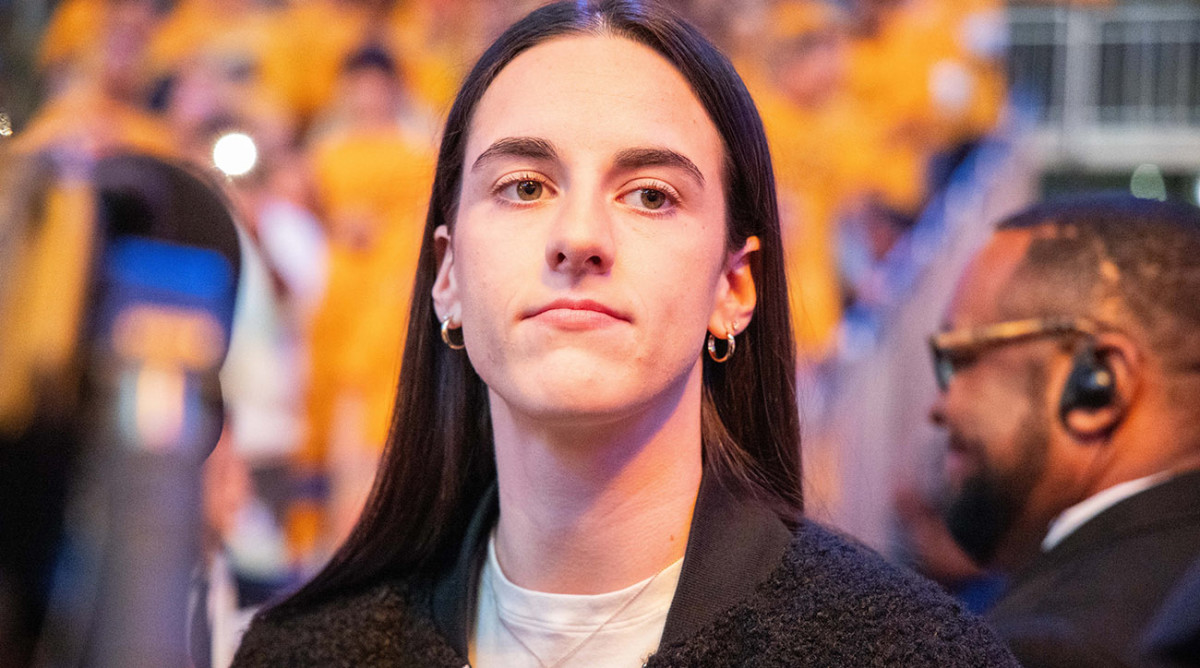 Indiana Fever guard Caitlin Clark appears at the Milwaukee Bucks-Indiana Pacers NBA playoff game in Indianapolis on April 26, 2024.