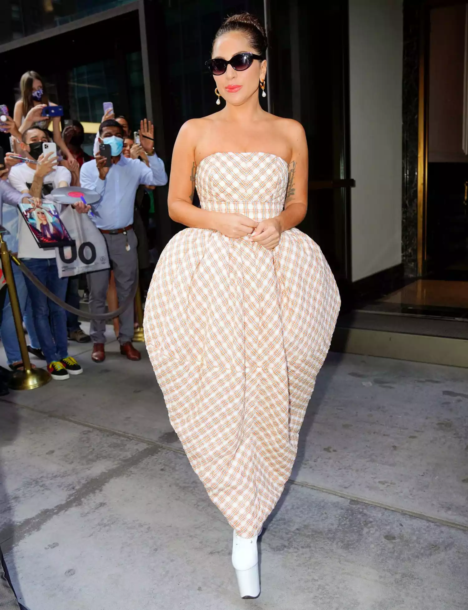 Lady Gaga exits her hotel on August 05, 2021 in New York City