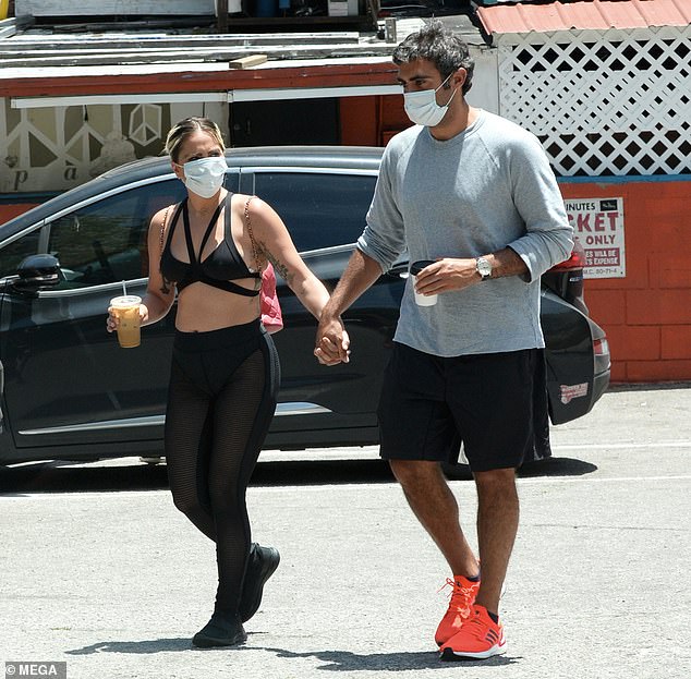 Love: Gaga was seen holding hands with her boyfriend, Michael Polansky