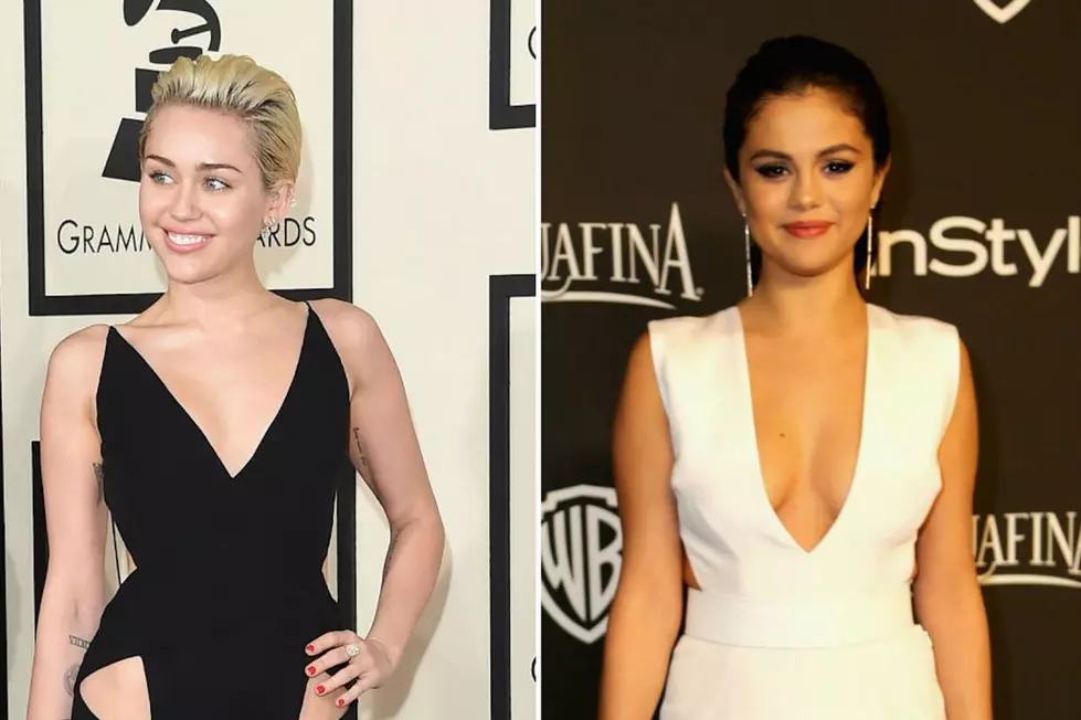 Miley Cyrus Waves Selena Gomez Cutout Onstage