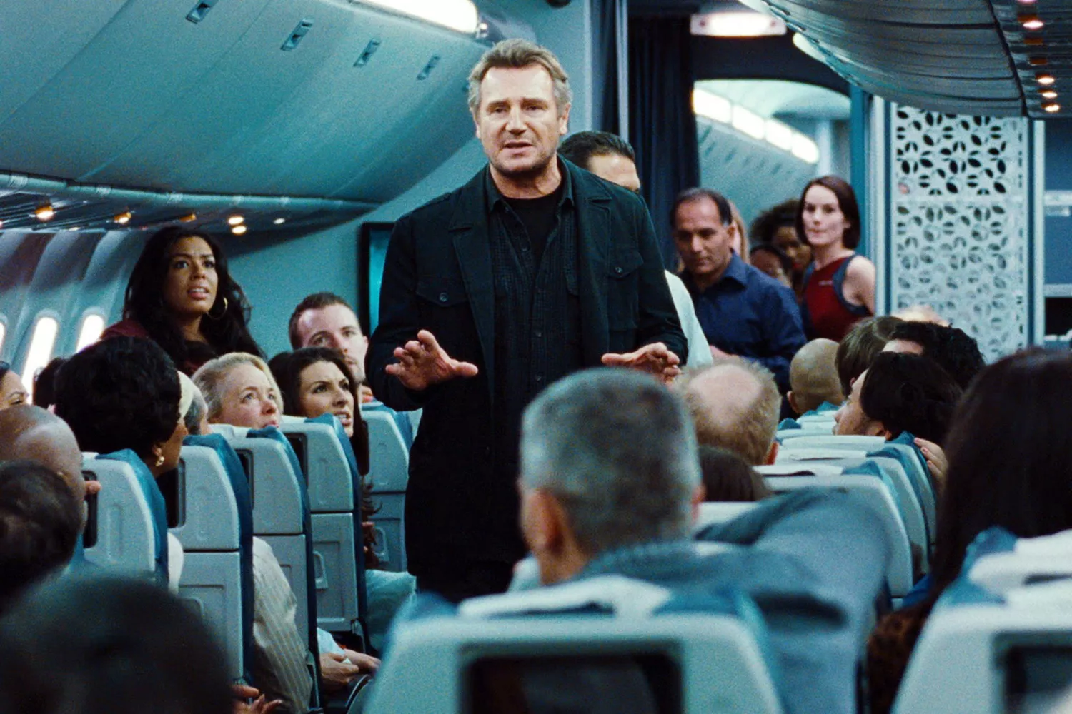 NON-STOP, Liam Neeson (left of center), 2014. ©Universal/courtesy Everett Collection