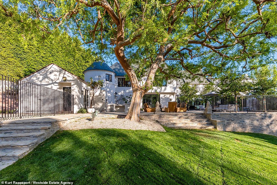 Beautiful: The five-bedroom home is nestled in the exclusive 90210 zip code and features state-of-the-art amenities after a complete remodel job