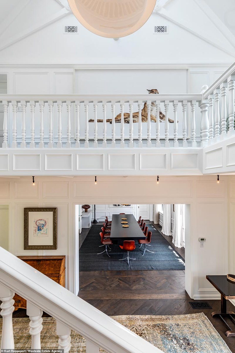 Squeaky clean: Situated behind large gates, the completely private home boasts a two-story grand entry way with a 50-foot living room