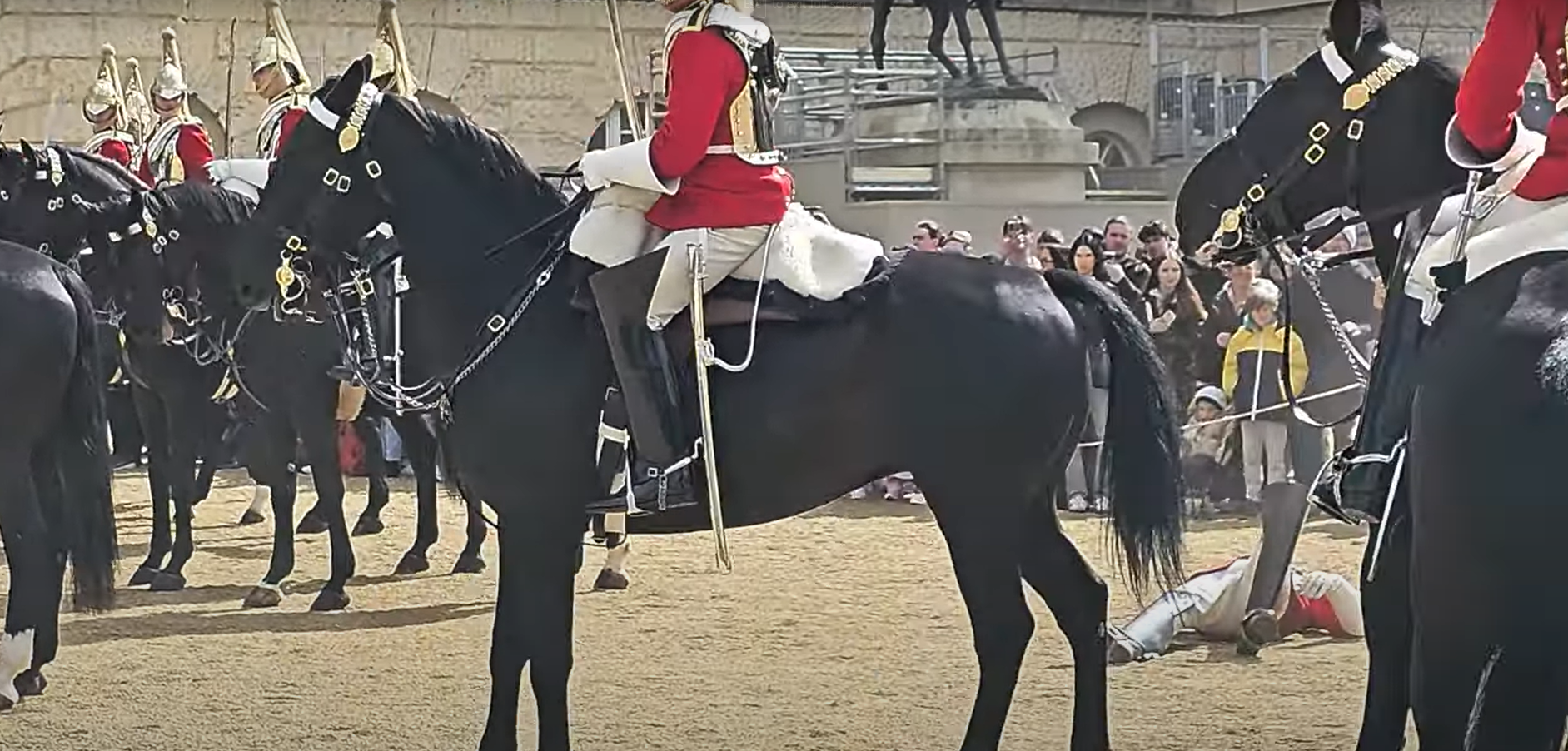 The rider was seen lying on the ground as medics rushed to his aid