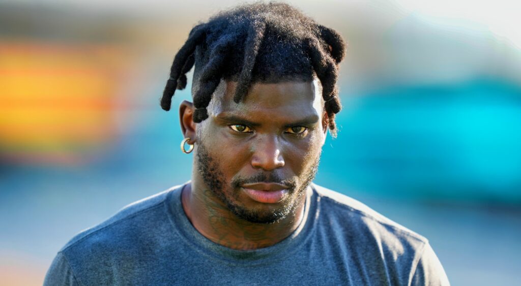 Tyreek Hill in Dolphins warmup shirt