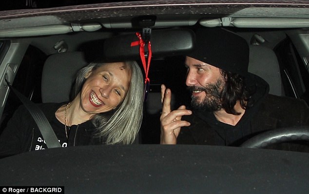 The mystery woman Keanu Reeves was spotted out to dinner with in West Hollywood on Monday night is artist and photographer Alexandra Grant (pictured) 