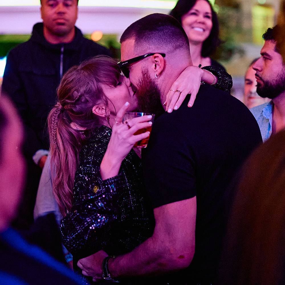 Taylor Swift and Travis Kelce Share a kiss inside DJ Booth at XS Nightclub inside Wynn Las Vegas on Feb. 11, 2024 after the Chiefs beat the 49ers in Super Bowl 2024. 