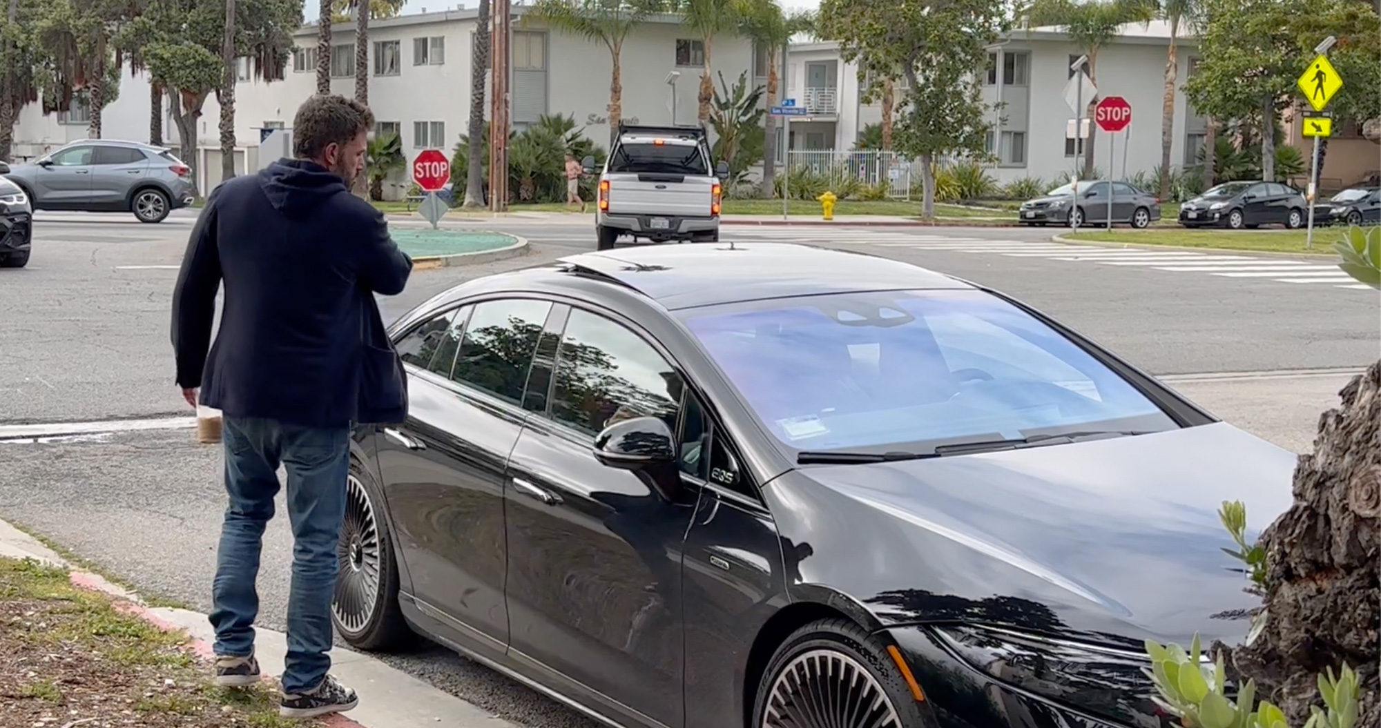 Ben Affleck slamming Jennifer Lopez's car door shut after a tense coffee run