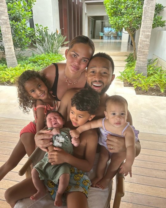 Chrissy Teigen and John Legend on first holiday as family of four