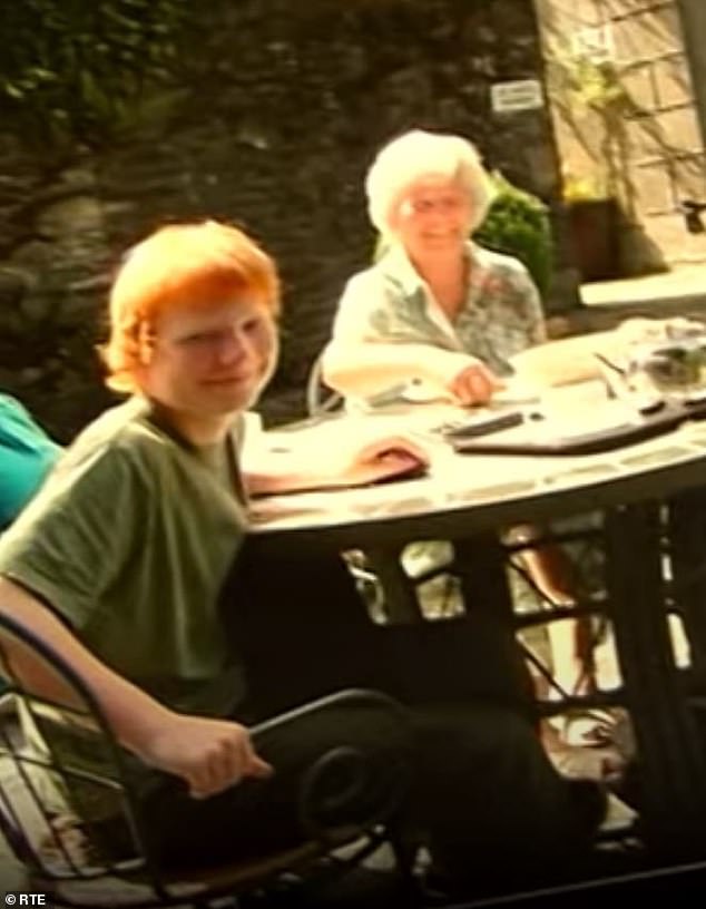 Tough: Ed began to struggle with his speech after medics once forgot to numb his face while lasering off a birthmark near his eye (pictured with his Irish grandmother Anne Mary)