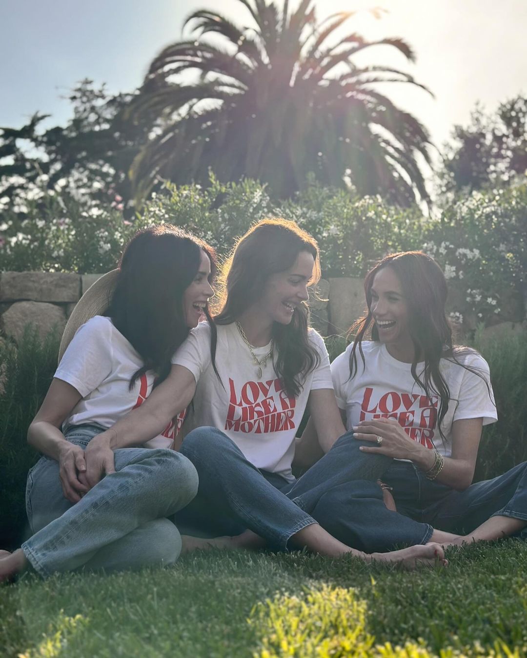 The Duchess of Sussex beamed barefoot with former Suits co-star Abigail Spencer (left) and former model Kelly Mckee Zajfen (centre) for a Mother's Day post